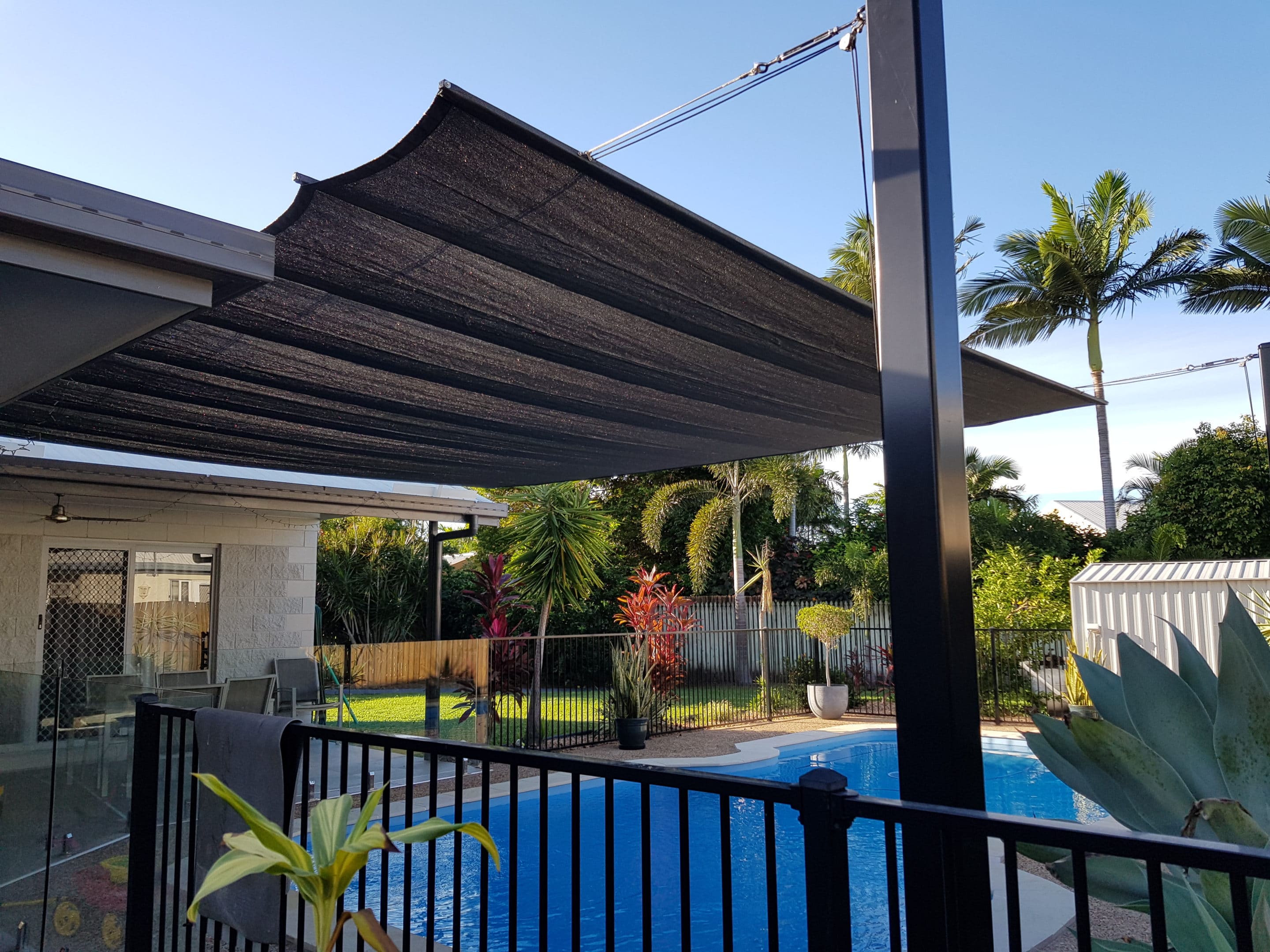 Charcoal retractable pool sail